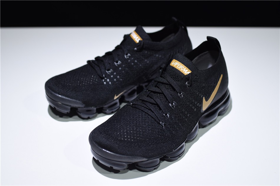 womens black and gold vapormax