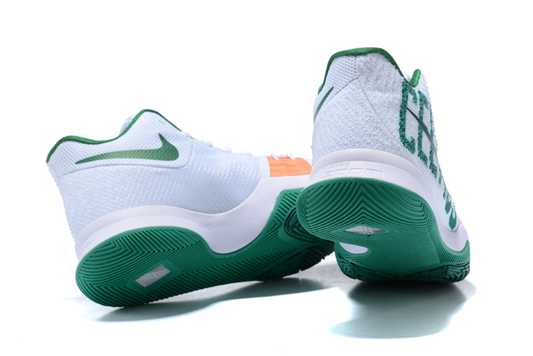 white and green nike basketball shoes