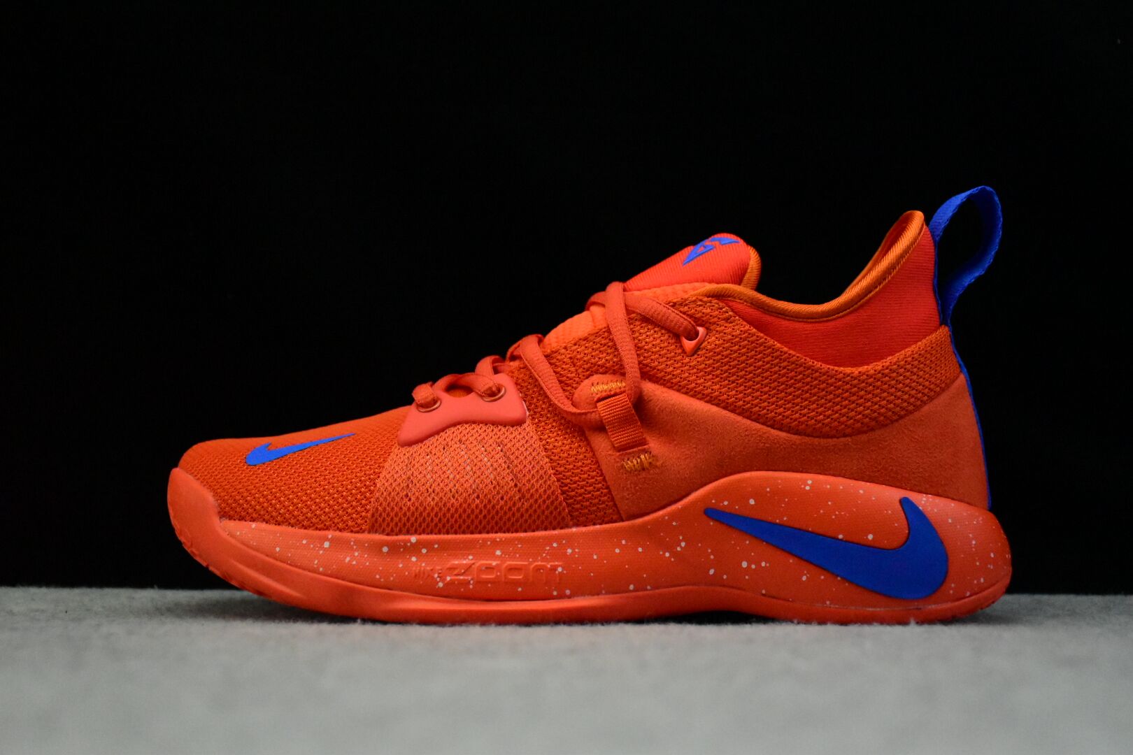 blue and orange basketball shoes