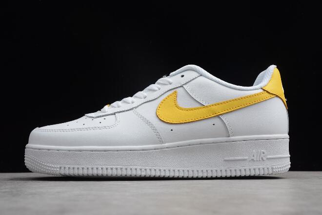 white and yellow nike air force