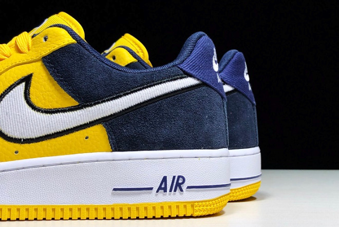 yellow and navy blue nikes